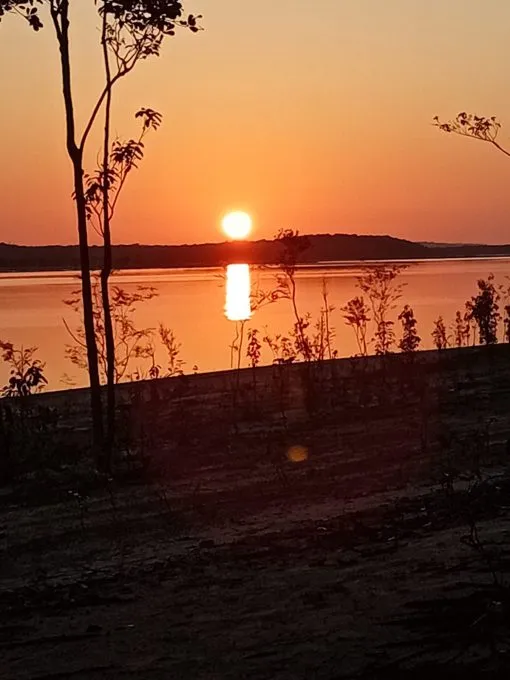 Sunset over the river during the longer lodge journey