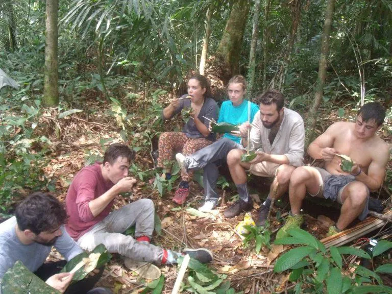 Lunch prepared and shared beneath the rainforest canopy