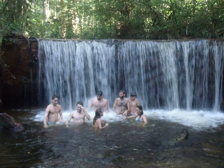 A guided walk ending at a secluded forest waterfall